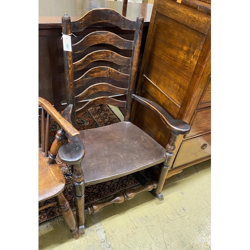 1087 - A 19th century ash and elm ladder back rocking elbow chair, width 66cm, depth 40cm