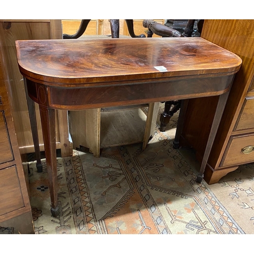 1093 - A George III banded mahogany D shaped folding tea table, width 96cm, depth 45cm, height 74cm