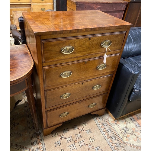 1094 - A small banded mahogany four drawer chest, width 67cm, depth 43cm, height 99cm