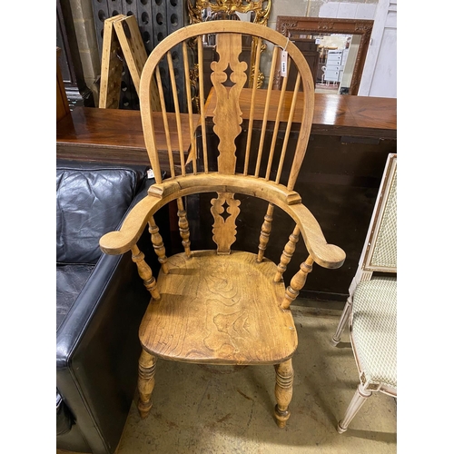 1096 - A bleached elm and beech Windsor armchair, width 69cm, depth 50cm, height 126cm