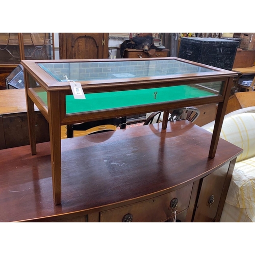 1109 - An Edwardian style glazed mahogany bijouterie low table, width 88cm, depth 45cm, height 46cm