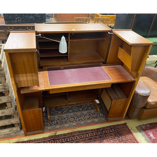 1112 - A mid century teak Magic Box enclosed desk possibly by Mummenthaler & Meier, Switzerland, interior... 