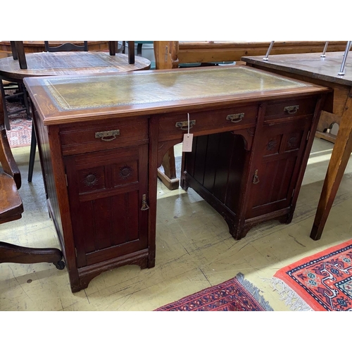 1116 - A late Victorian Aesthetic movement oak kneehole writing table, width 120cm, depth 60cm, height 74cm... 