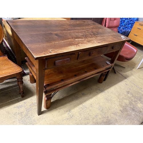 1118 - A mid century oak writing table with planked top and three drawers, length 130cm, depth 78cm, height... 