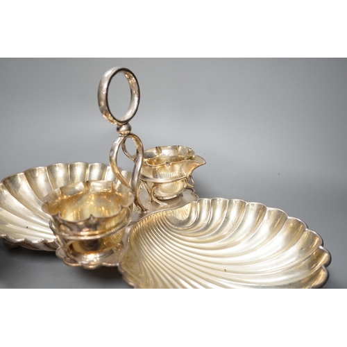 1335 - A silver plated strawberry and cream stand with a silver mounted coaster, and a plated biscuit barre... 