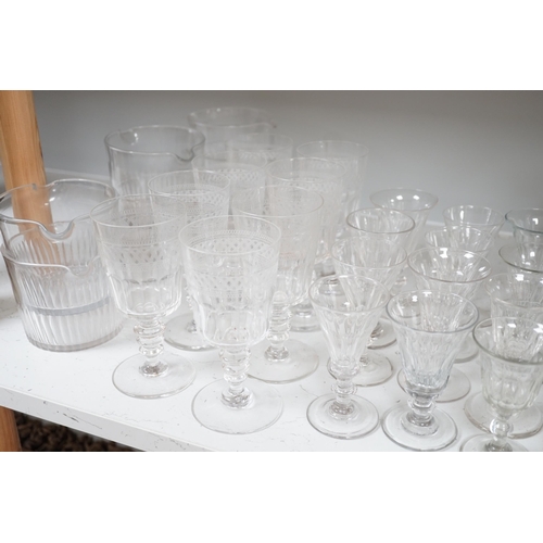 1338 - Assorted 19th and 20th century drinking glasses, rinsers, an etched vase, a pair of cut glass decant... 