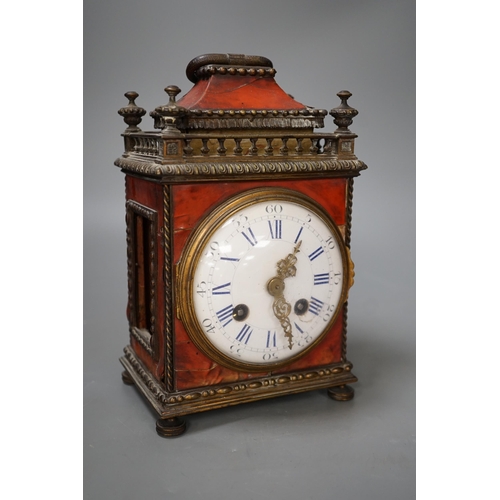 1341 - A 19th century French tortoiseshell mantel clock. 24cm high