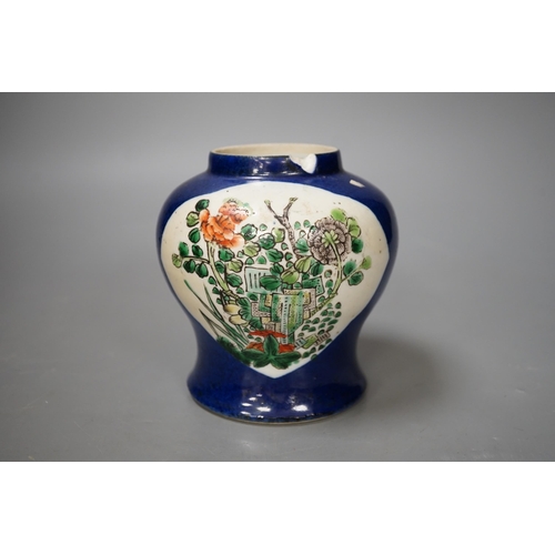 1344 - A Chinese powder blue vase, late 19th century,  with panelled floral decoration (a.f.). 12cm high... 