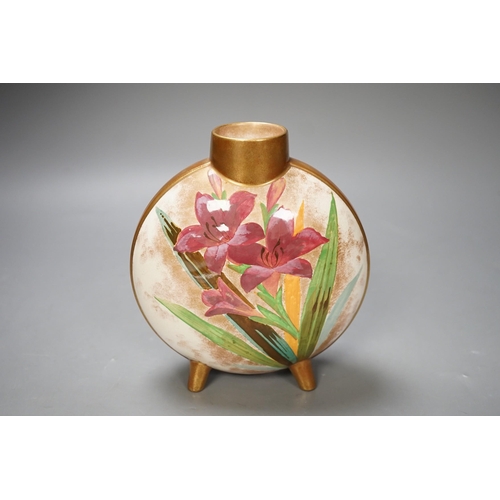 1348 - A Doulton style moonflask with painted flower lily decoration. 16cm high