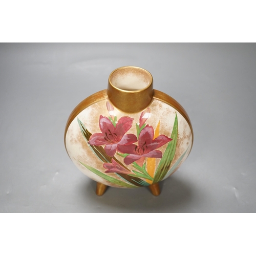 1348 - A Doulton style moonflask with painted flower lily decoration. 16cm high