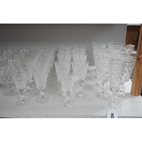 1354 - A quantity of Stuart cut glass suite of wine and spirit glasses and a similar pair of decanters... 