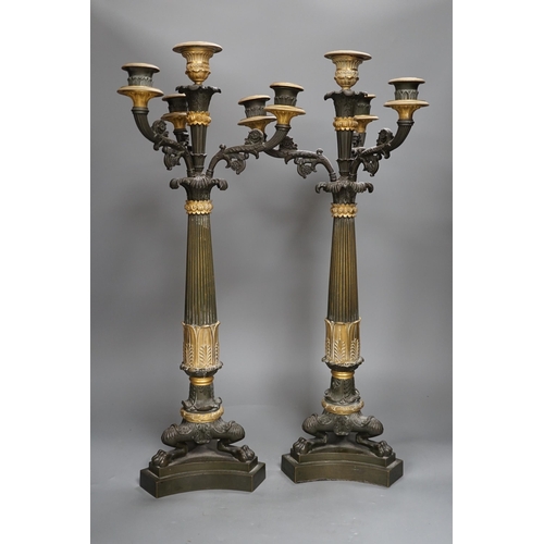 1358 - A pair of 19th century French Empire style bronze and gilt metal three branch, four light candelabra... 