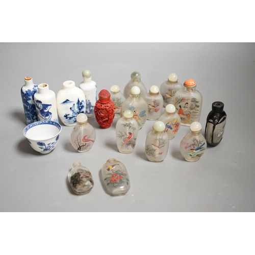 1457 - A collection of 20th century Chinese export reverse painted snuff bottles with associated blue and w... 