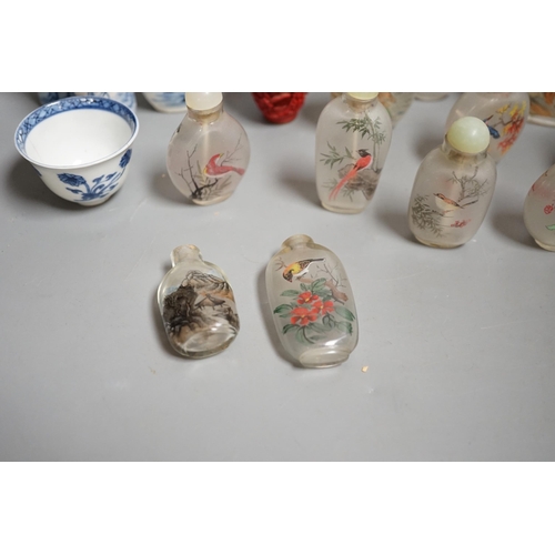 1457 - A collection of 20th century Chinese export reverse painted snuff bottles with associated blue and w... 