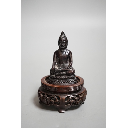 1462 - A Chinese resin snuff bottle, a resin Buddha on stand and a resin netsuke