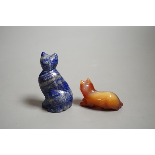 1463 - A Chinese carved lapis lazuli seated cat, a banded agate recumbent cat on hardwood stand and a white... 