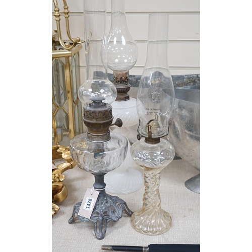 1478 - Three oil lamps, two with glass bases, tallest 56cms high,