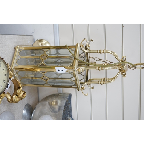 1479 - A hexagonal brass and bevelled glass hall lantern, 70 cms high,