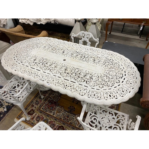 110 - A Victorian style painted cast aluminium garden table, length 180cm, width 90cm, height 72cm and fou... 