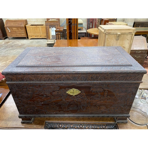 138 - A carved teak coffer, length 101cm, depth 52cm, height 58cm