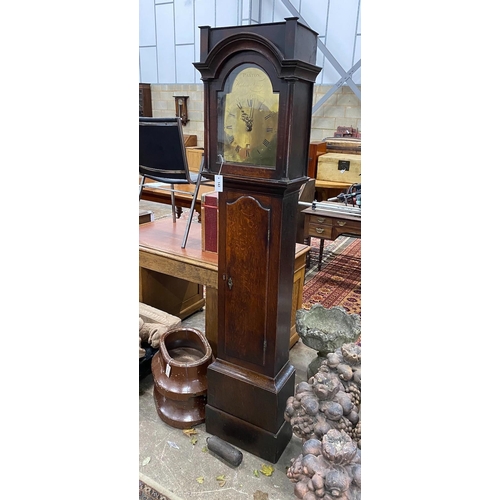 143 - An early 19th century oak 30 hour longcase clock, the arched brass dial marked Paxton, Higham Ferrer... 