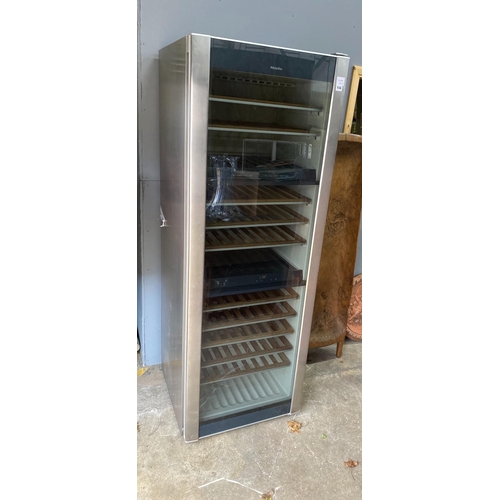 156 - A Miele free standing wine storage fridge, (Pat tested), width 65cm, depth 66cm, height 184cm