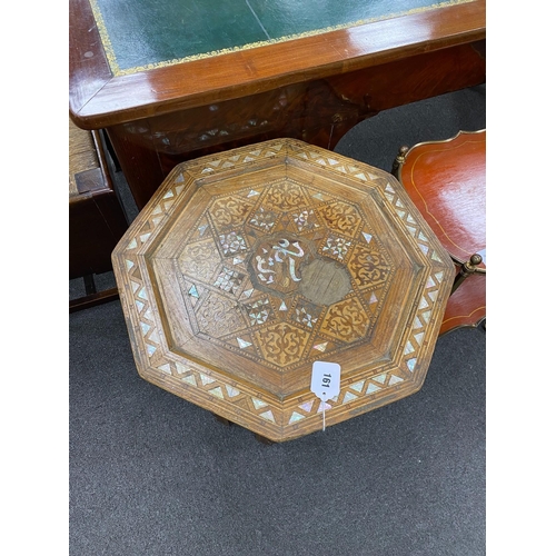 161 - A Moorish octagonal mother of pearl inlaid table width 48cm, height 62cm.