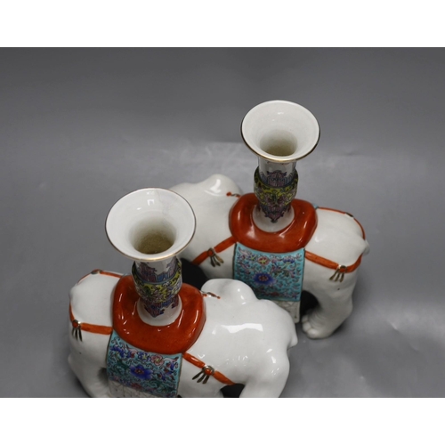 258 - A pair of Chinese enamelled porcelain elephant vases, 27cm high