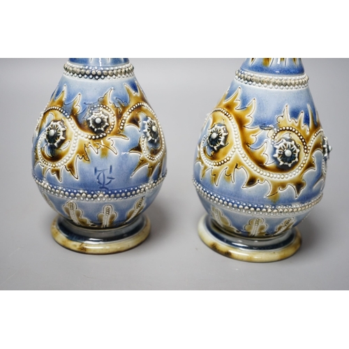 261 - George Tinworth, a pair of Doulton Lambeth vases, stamped 1876, 20cm high