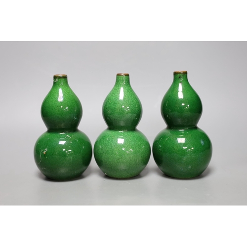 267 - Three Chinese green crackle glazed double gourd vases, 15cm