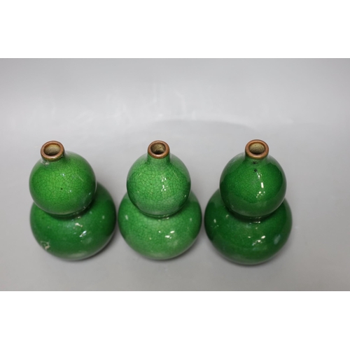 267 - Three Chinese green crackle glazed double gourd vases, 15cm