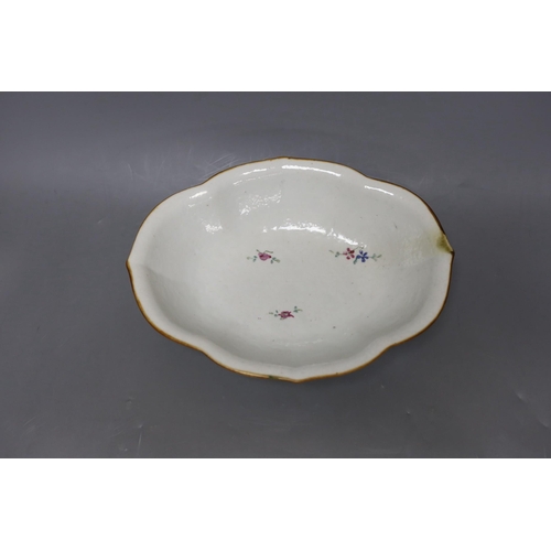 269 - A Chinese inscribed famille rose footed dish, mid 19th century, 28cm long