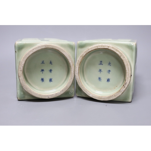 275 - A pair of early 20th century Chinese celadon glazed eight trigrams cong vases, 25cm