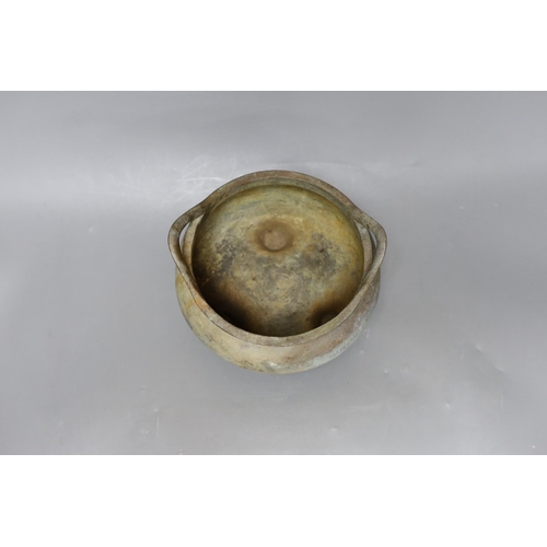 277 - A Chinese two handled bronze censer, 18cm handle to handle