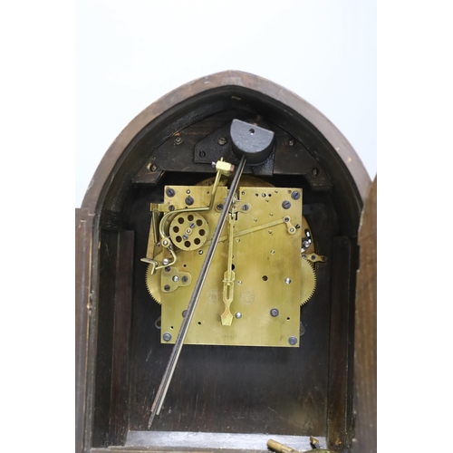 278 - An oak cased chiming bracket clock, 34.5 cm high