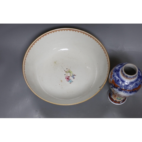 284 - An 18th century Chinese export famille rose bowl and a similar mandarin pattern vase, bowl 26cm diam... 