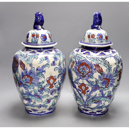 292 - A pair of Belgian keramis jars and covers, 41cm