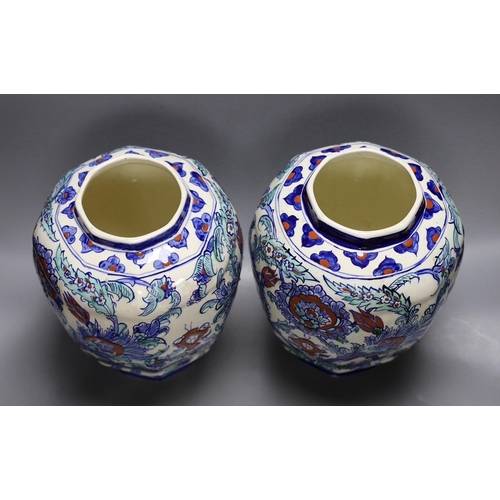 292 - A pair of Belgian keramis jars and covers, 41cm