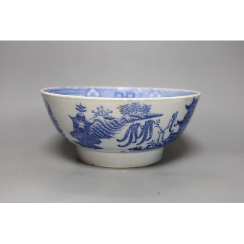 295 - An early 19th century pearlware blue and white punch bowl, 27cm