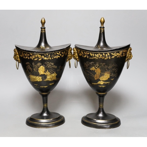 297 - A pair of Japanned toleware urns and covers, 33cm tall