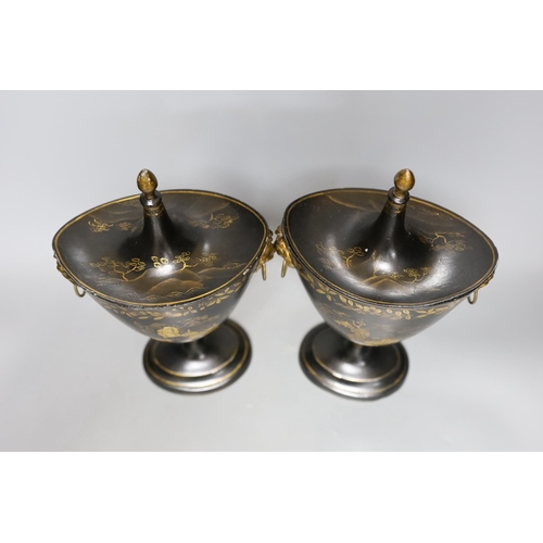 297 - A pair of Japanned toleware urns and covers, 33cm tall