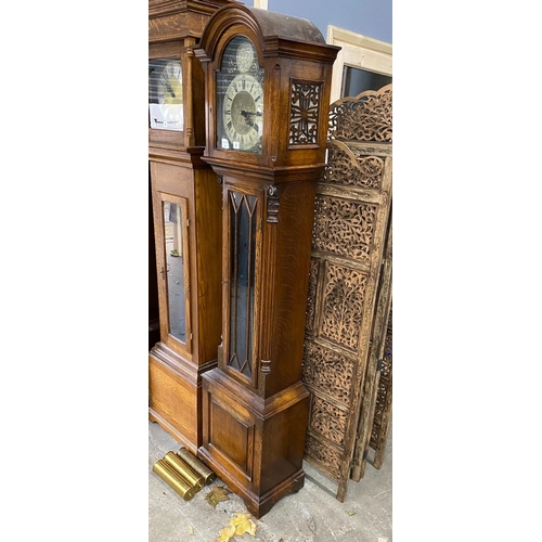 3 - A modern oak longcase clock, with "Tempus Fugit" in the arch, height 195cm