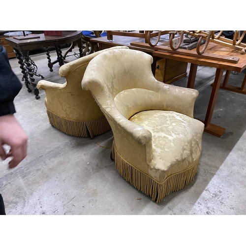 30 - A pair of late Victorian upholstered tub framed armchairs