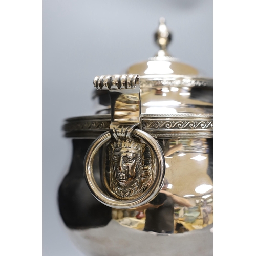 307 - A 19th century silver plated tea urn, Egyptianesque handles, 43cm