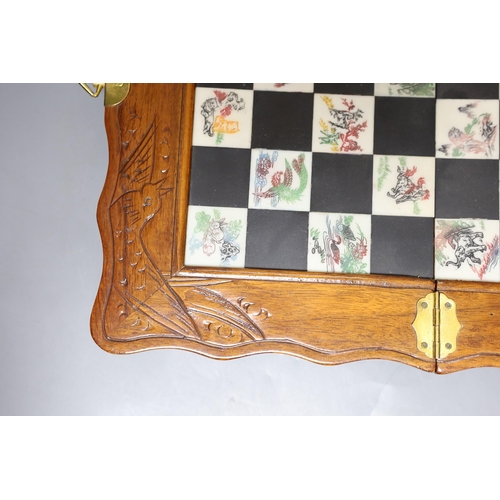 315 - A Chinese chess set with resin pieces, 39x39cm