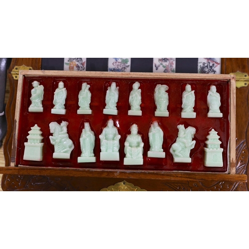 315 - A Chinese chess set with resin pieces, 39x39cm