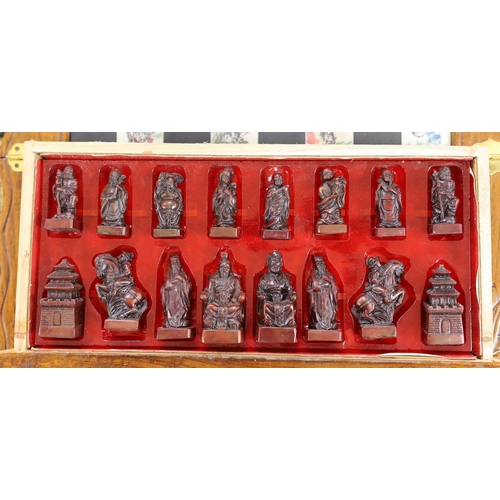 315 - A Chinese chess set with resin pieces, 39x39cm