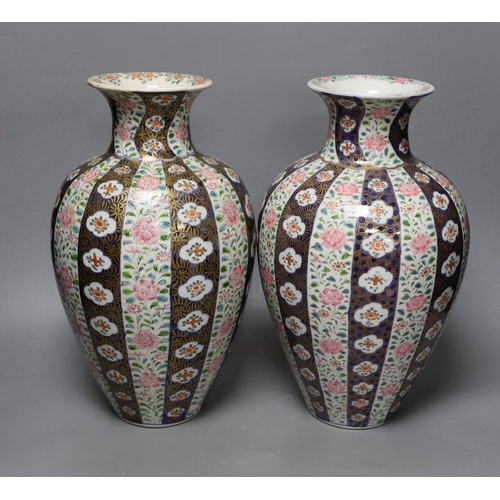 318 - A pair of Japanese 'Imari' ovoid vases, Meiji period, 36cm