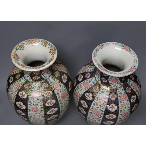 318 - A pair of Japanese 'Imari' ovoid vases, Meiji period, 36cm