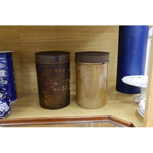 331 - A pair of 19th century cylindrical salt glazed stoneware canisters, with Royal coat of arms spriggin... 